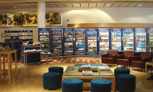 Norsk Megling International at a fair with properties from France, Spain, Greece and the USA